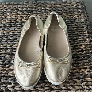 Fitflop ballet slip on shoes size 7.5. Shiny gold